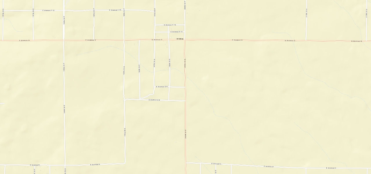 Wider street view of 200th Street East and Avenue G-8